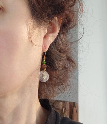 Golden mismatched green howlite earrings